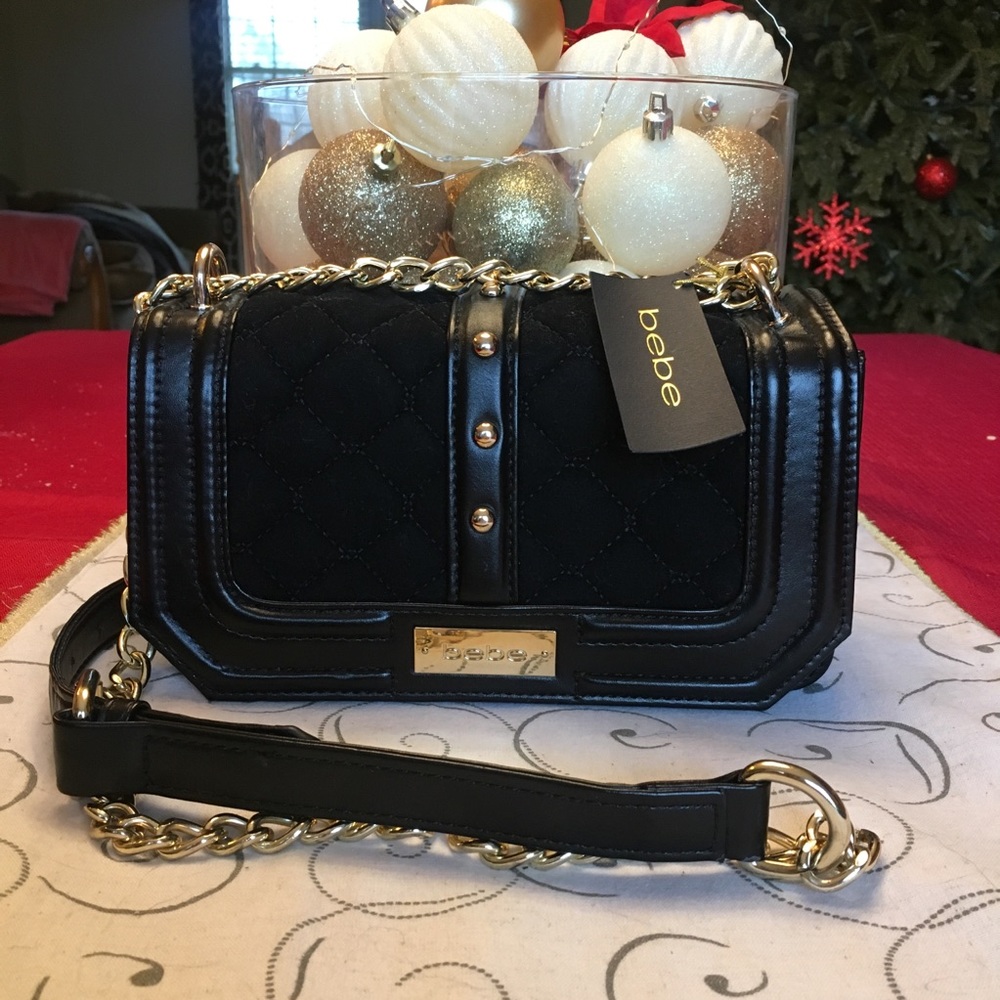 ❌SOLD ON Ⓜ️❌ Black and Gold Bebe purse